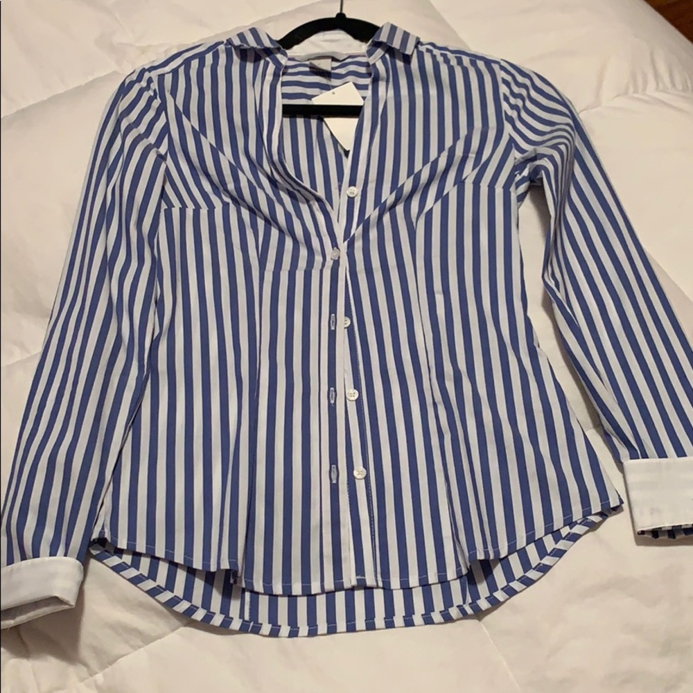Size 2 blue and white stripped button .